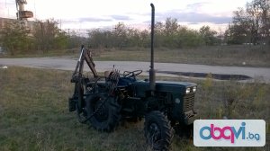 Трактор с хидравлична уредба и прикачен инвентар