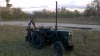 Трактор с хидравлична уредба и прикачен инвентар